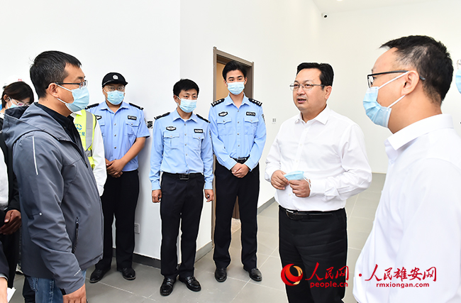張國華調研容西片區安置房及配套設施收尾和交付點準備工作情況。劉向陽攝