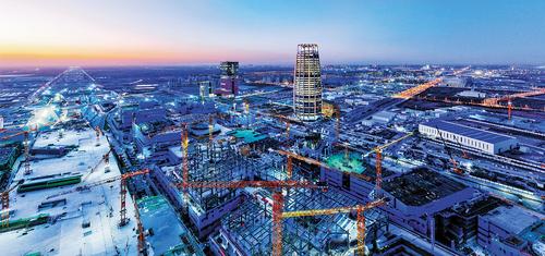 今年1月航拍的雄安國貿中心項目建設現場。雄安新區財政局通過“投建運一體化”模式，吸引經營主體購買雄安集團雄商置業公司30%股權，有效吸引社會資本支持雄安國貿中心項目建設。（本報資料片）雄安新區宣傳網信局供圖
